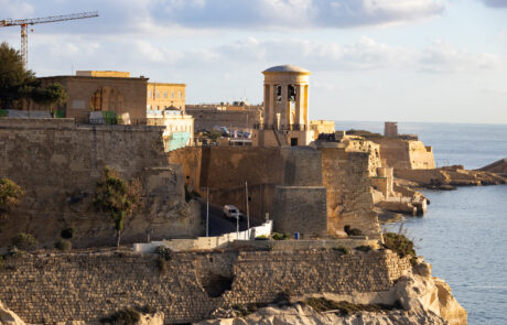 Fortified harbor walls and watchtower at Senglea, Malta