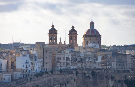 Domed church skyline of Senglea overlooking the harbor, Malta