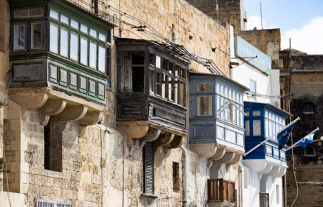 Traditional Maltese balconies on a historic building facade