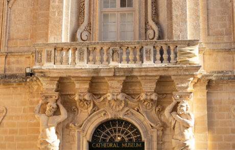 Ornate baroque museum entrance facade in Mdina, Malta