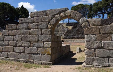 Ancient stone archway ruins at the Tindari archaeological site, Sicily