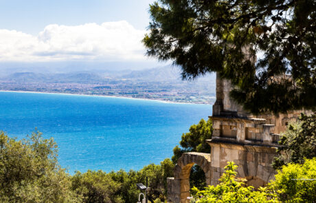 Coastal view over olive trees toward the sea at Tindari, Sicily
