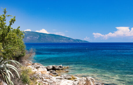 Small pebble beach cove with turquoise water at Kefalonia