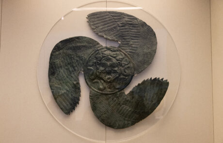 Bronze shield with griffin-head decoration at the Olympia Archaeological Museum