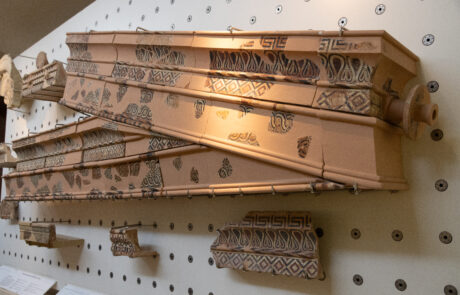Ancient decorated architectural beam fragment displayed at the Olympia museum