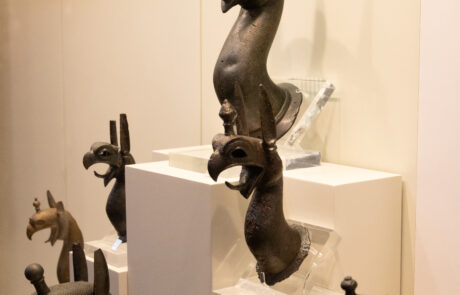 Small bronze figurine group depicting a mythological combat scene at the Olympia Archaeological Museum