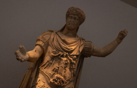 Ancient marble statue of a robed figure at the Olympia Archaeological Museum
