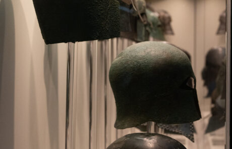 Ancient bronze helmets displayed at the Olympia Archaeological Museum