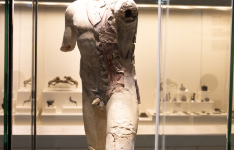 Ancient marble chest artifact displayed at the Olympia Archaeological Museum