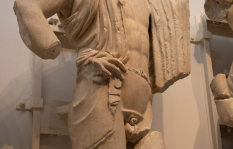 Marble pediment sculpture fragment with a bearded head at the Olympia Archaeological Museum