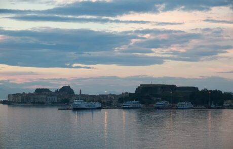 Twilight sky over Corfu Old Fortress and the harbor