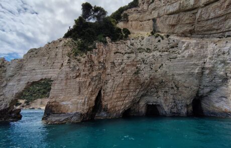 White limestone rock arch formations at the Zakynthos Blue Caves
