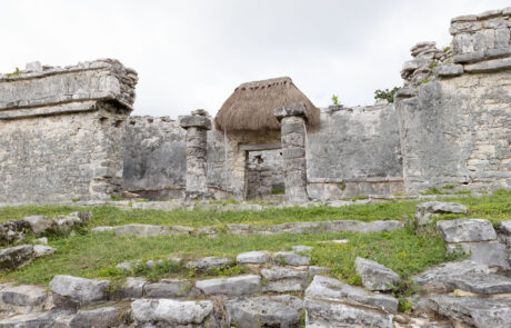Mayan stone ruins with a small structure and doorway, Tulum